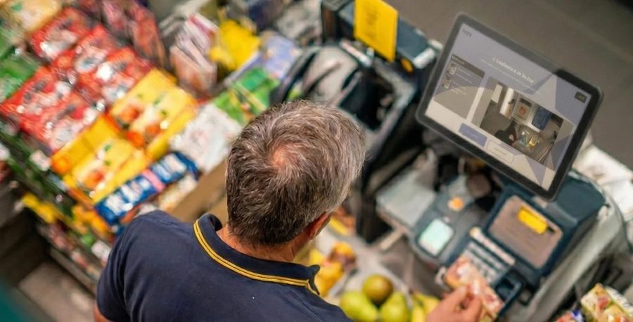 A staffed checkout lane running Edgify on existing hardware